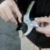 Sécateur courbe à crémaillère